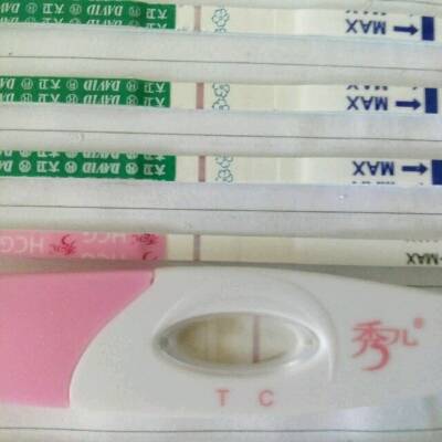 月经10月14号到现在11月13号测出两条杠很浅很淡 一直测到19号还是很淡没加深 小腹有大姨妈那种痛乳房痛 就是测不到强阳 请问我是不是怀孕了 宝宝树